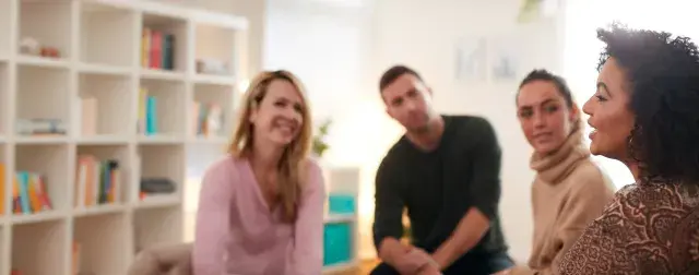 People talking in a group setting